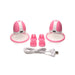 Set of two pink and white rotating silicone nipple suckers with interchangeable nub attachments and USB charging cable.
