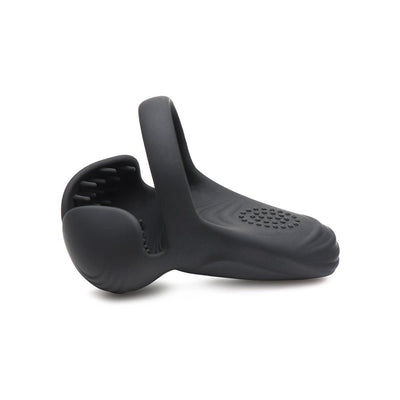 Black silicone vibrating cock ring with textured taint stimulator and flexible design shown on white background.