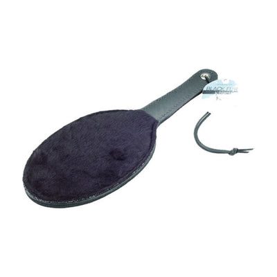16-inch black faux fur ping pong paddle with leather handle and attached wrist strap on white background