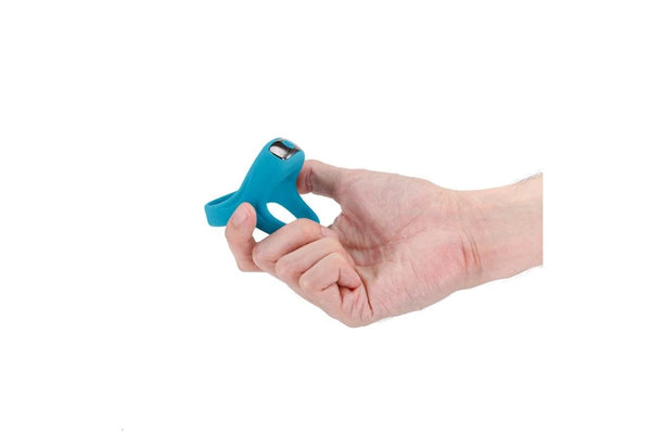 Hand holding a teal Renegade Emperor vibrating ring designed for comfort and pleasure.