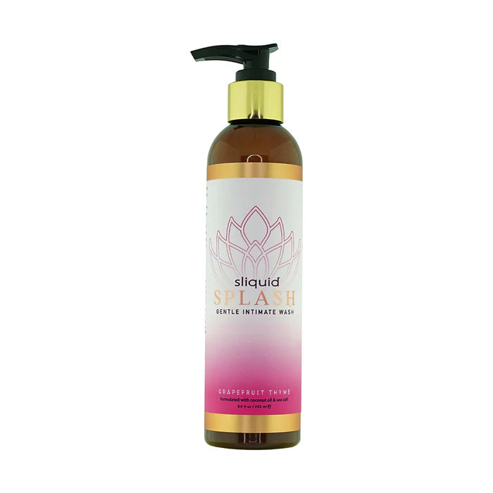 Bottle of Sliquid Splash Grapefruit Thyme gentle intimate wash with pump dispenser and pink gradient label.