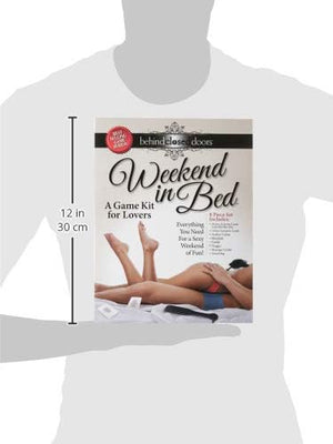 Weekend In Bed Game Kit box featuring romantic couple and list of included playful items for couples.