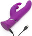 Purple silicone rabbit vibrator with curved shaft and USB charging cable attached on white background