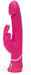 Pink dual-density silicone rabbit vibrator with curved shaft and dual motor controls at base.