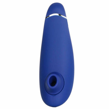 Blue Womanizer Premium clitoral air pulsator with smooth silicone surface and ergonomic design.