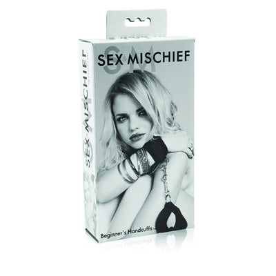 Packaging of Beginner's Handcuffs in black from the Sex Mischief collection featuring a black and white image of a woman wearing the cuffs.