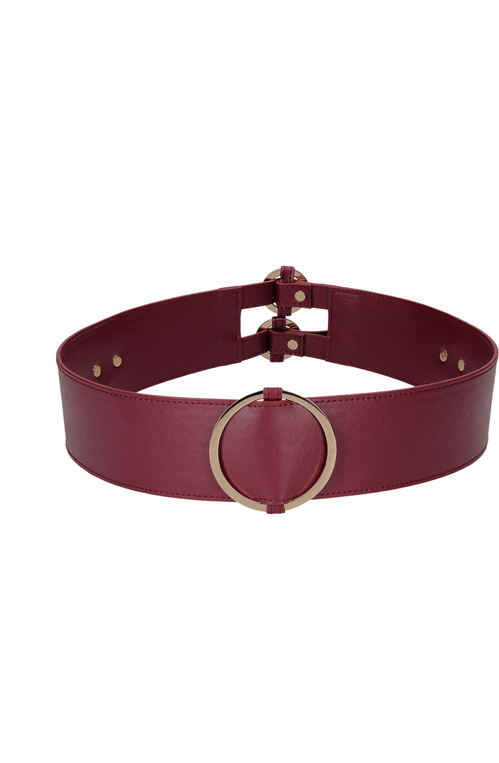 Wide burgundy leather waist belt with gold-tone circular ring and adjustable straps for BDSM play.