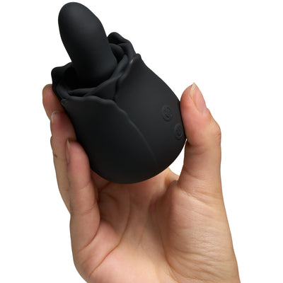 Hand holding a black silicone rose-shaped rimming toy with vibration and rotation features.