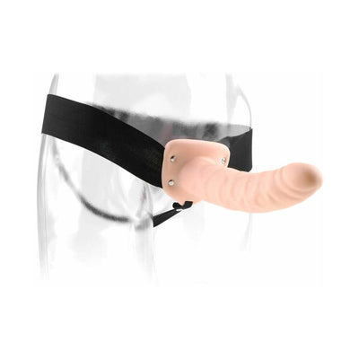 8-inch realistic hollow strap-on dildo with adjustable black elastic harness on clear mannequin hips.