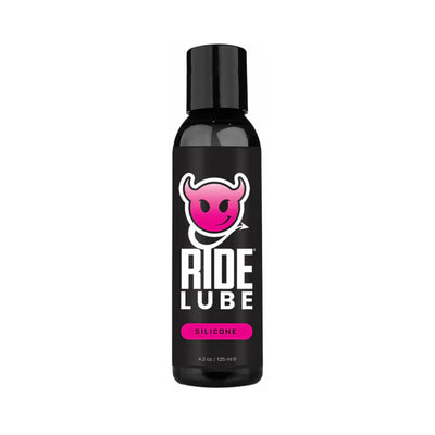 Black 4.2 oz bottle of Ride Bodyworx silicone lubricant with pink devil logo and bold white text on label.