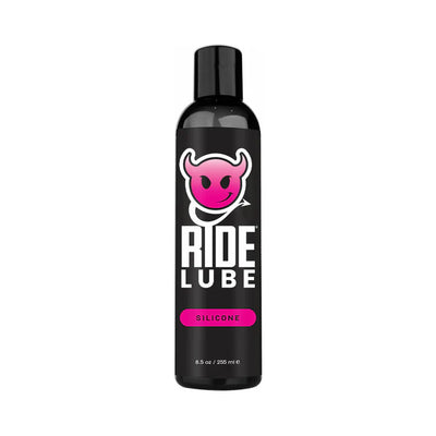Bottle of Ride Bodyworx silicone lubricant with black packaging and pink devil logo, 8.5 oz size.