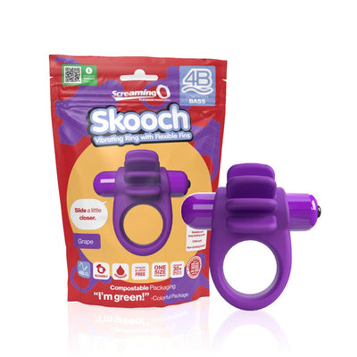 Purple 4B Skooch vibrating ring with flexible fins next to its colorful red and orange eco-friendly packaging.