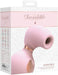 Packaging of Shots Irresistible Invincible clitoral vibrator in soft pink with rose gold accents and product features listed.