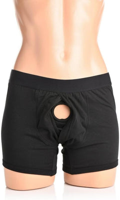 Black boxer-style harness with a hidden front O-ring displayed on a mannequin torso.