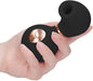 Hand holding a black and rose gold ergonomic clitoral vibrator with a rounded suction head and single control button.