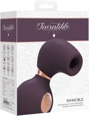 Packaging box of Shots Irresistible Invincible clitoral vibrator in dark purple with rose gold accents and product features.