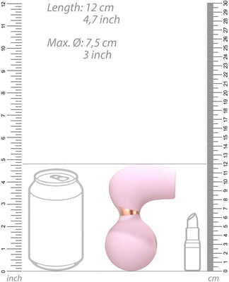 Pink ergonomic clitoral vibrator with rose gold accent, shown next to a soda can and lipstick for size comparison.