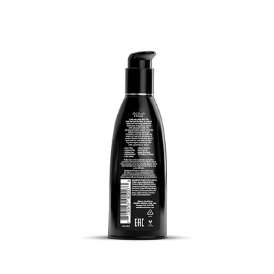 Black pump bottle of Wicked Aqua Heat water-based warming sensation lubricant with detailed label text on a white background.