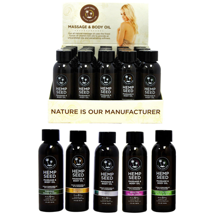 Display of 25 small bottles of Hemp Seed Massage & Body Oil in five scents, arranged in a branded box with natural skincare theme.