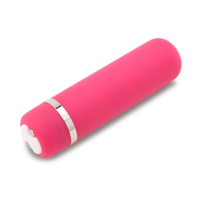 Compact pink bullet vibrator with smooth silicone coating and silver accent ring on white background.