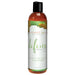 Bottle of Intimate Earth Defense Protection Glide lubricant with sea kelp, tea tree oil, and guava bark extract.