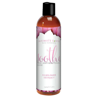 Bottle of Intimate Earth Soothe Anal Anti-Bacterial Glide with guava bark extract, featuring a floral-themed label and black cap.