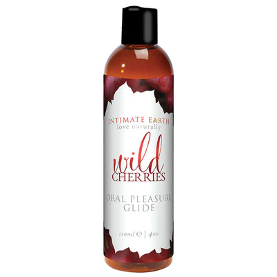 Bottle of Intimate Earth Wild Cherries flavored oral pleasure glide lubricant with black cap and cherry-themed label.