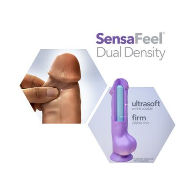 Close-up of hand squeezing soft outer layer of a dual density dildo with diagram showing ultrasoft exterior and firm core.