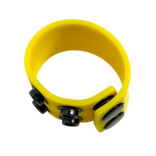 Yellow silicone ball strap with black snap closures for adjustable sizing and comfort.