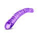 Purple textured double-ended dildo with curved design on white background