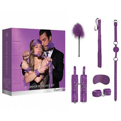 Beginners Bondage Kit in purple with hand and leg cuffs, ball gag, flogger, feather tickler, and satin eye mask.