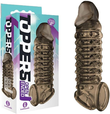 The 9's Toppers open-ended, ribbed, and nubbed penis extender in translucent dark material with packaging box.