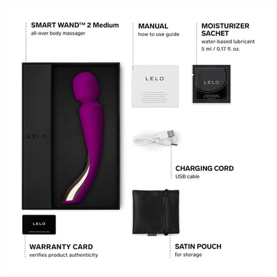 Insignia Smart Wand 2 Medium purple body massager with USB charger, manual, moisturizer sachet, warranty card, and satin storage pouch.