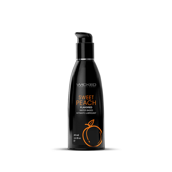 Black pump bottle of Wicked Aqua Sweet Peach flavored water-based intimate lubricant with orange peach graphic.