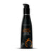 Black pump bottle of Wicked Sweet Peach flavored water-based intimate lubricant 4oz with orange text and peach graphic.
