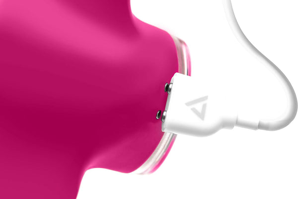 Close-up of magenta Clandestine Devices Mimic Plus with magnetic USB charging cable attached.