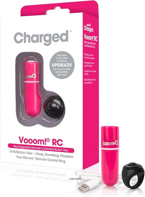Charged Vooom remote control bullet vibrator with USB charging cable and silicone remote control ring in pink and black.