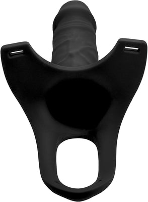 Black hollow silicone dildo strap-on with adjustable nylon harness and realistic texture.