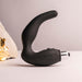 Black Naughty-Boy prostate and perineum stimulator with removable silver bullet vibrator on a neutral background.