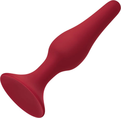 Smooth red silicone tapered anal plug with flared base for comfortable and safe use.