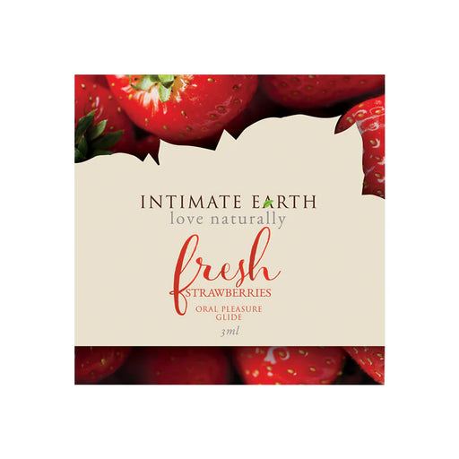Intimate Earth Fresh Strawberries oral pleasure glide packaging with fresh strawberries background and natural design.