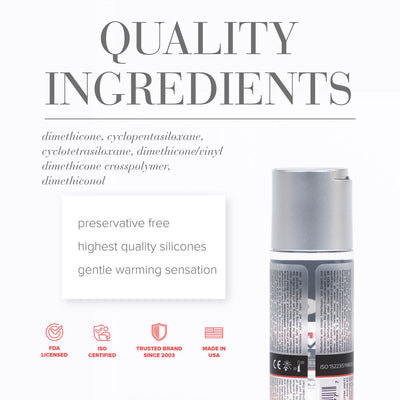 Bottle of Jo Premium Warming Silicone Lubricant with text highlighting quality ingredients and product certifications.
