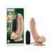 Vanilla-colored 9-inch realistic vibrating adult toy with suction cup base and black wired remote control next to packaging.