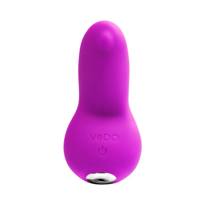 Compact purple VeDO Izzy rechargeable clitoral vibrator with smooth silicone and power button on front.