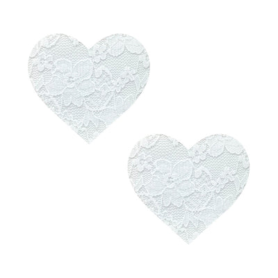 Pair of white heart-shaped nipple covers with delicate floral lace texture on a white background.