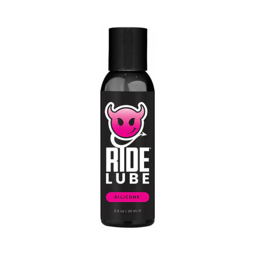 Black 2 oz bottle of Ride Bodyworx silicone lubricant with pink devil logo and bold white text on label.