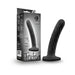 Black Temptasia Twist Medium silicone dildo with swirling texture and heart-shaped suction cup base next to its packaging box.
