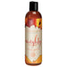 Bottle of Intimate Earth Naughty Nectarines natural flavored water-based glide with peach-themed label and black cap.