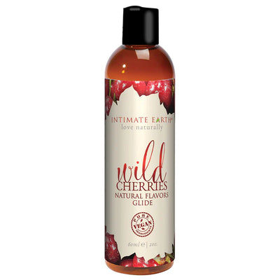 Bottle of Intimate Earth Wild Cherries flavored natural glide lubricant with vegan ingredients label.