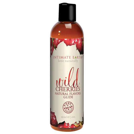 Bottle of Intimate Earth Wild Cherries flavored natural glide lubricant with vegan ingredients label.